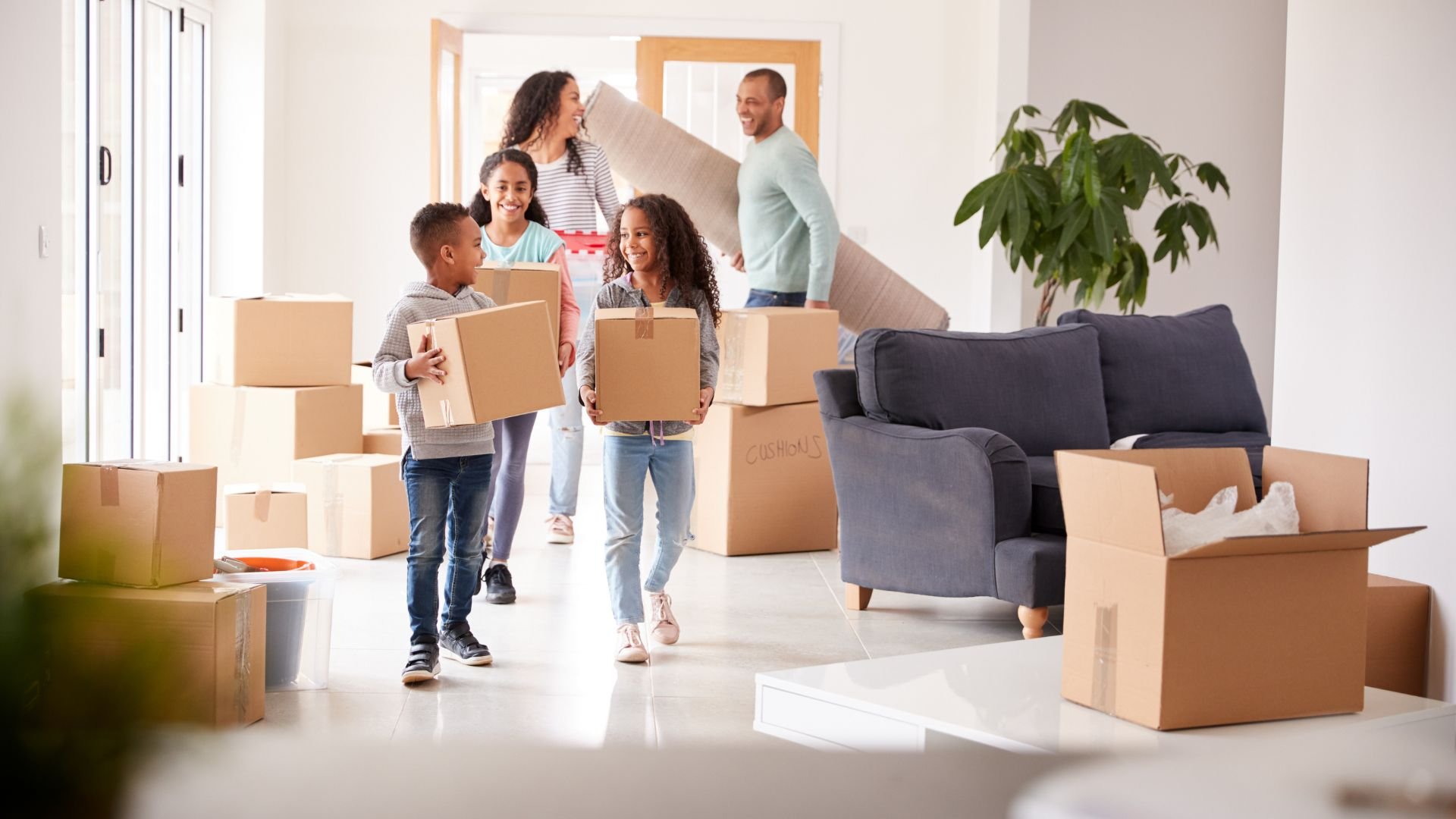 Family moving into their new rental home